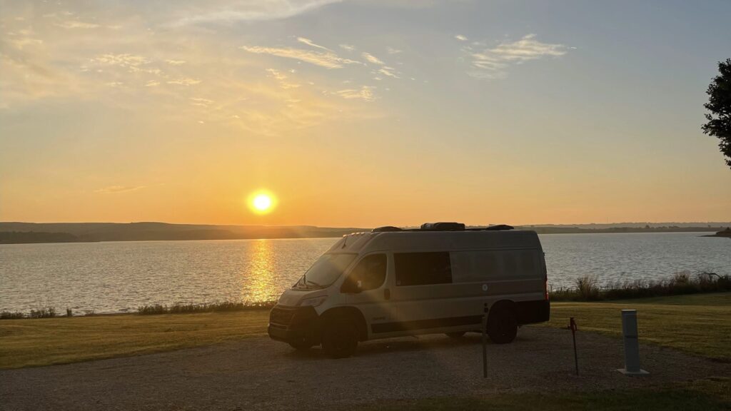 van at sunrise over Wilson Lake, Kansas